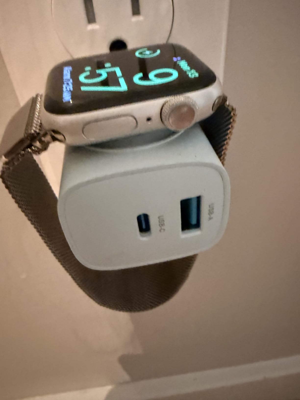 Apple Watch resting on the charging surface during everyday use